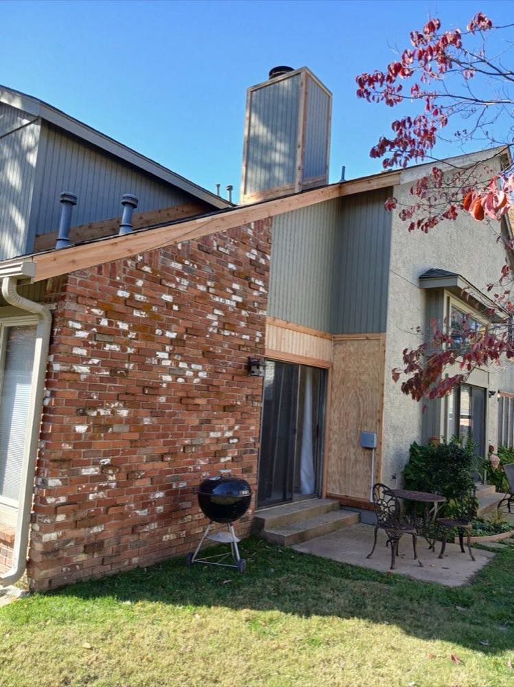 Exterior repair in progress with new framing and flashing on a Tulsa home